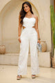 Enterizo DF11056 cut out para mujer, silueta ajustada, elaborado en poliéster dyaboo color crudo